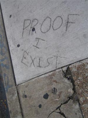 Proof I Exist written in cement